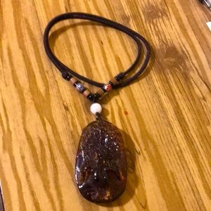 Necklace with a Plastic peacock